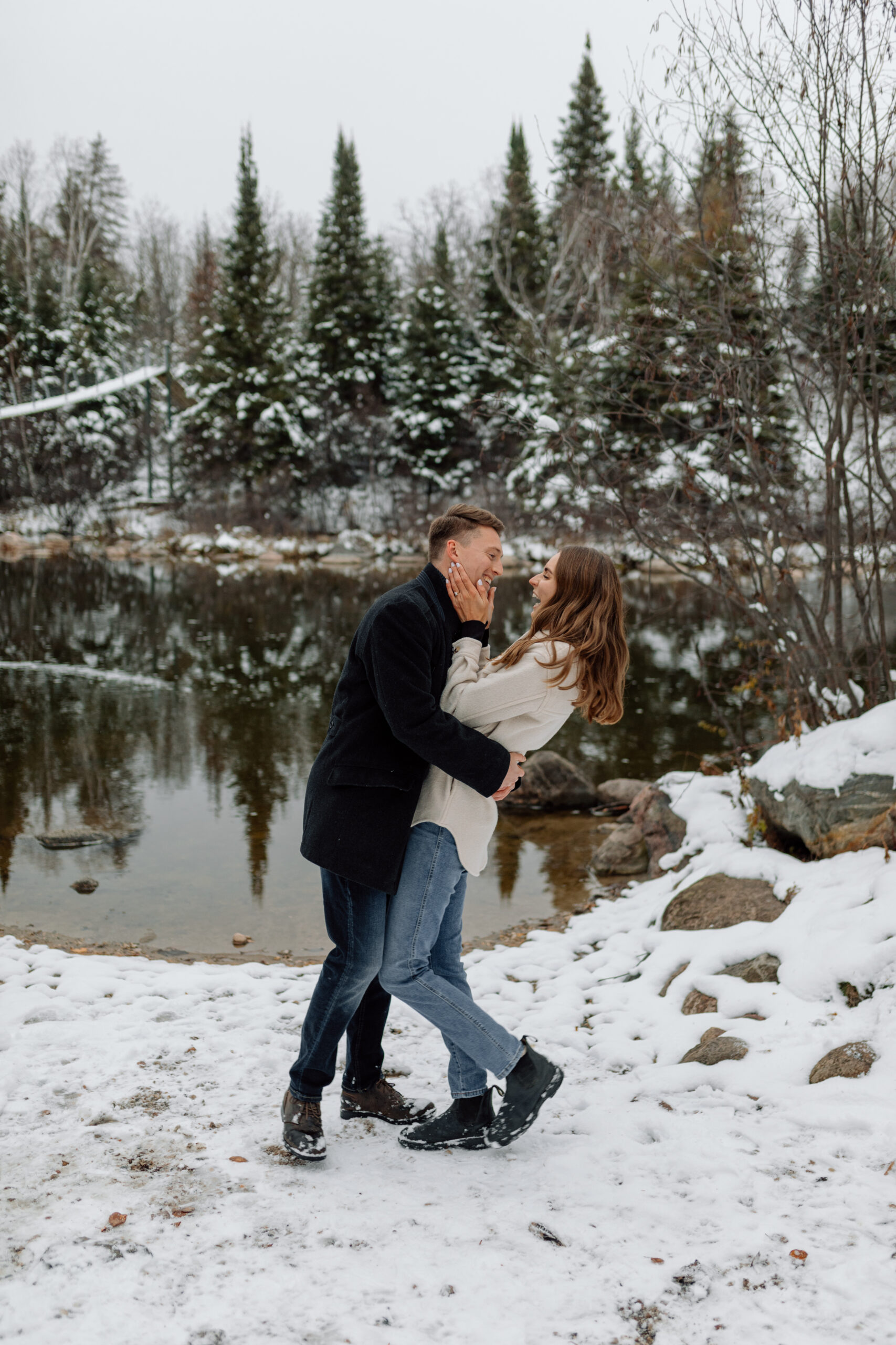 Couple laughing in the snow