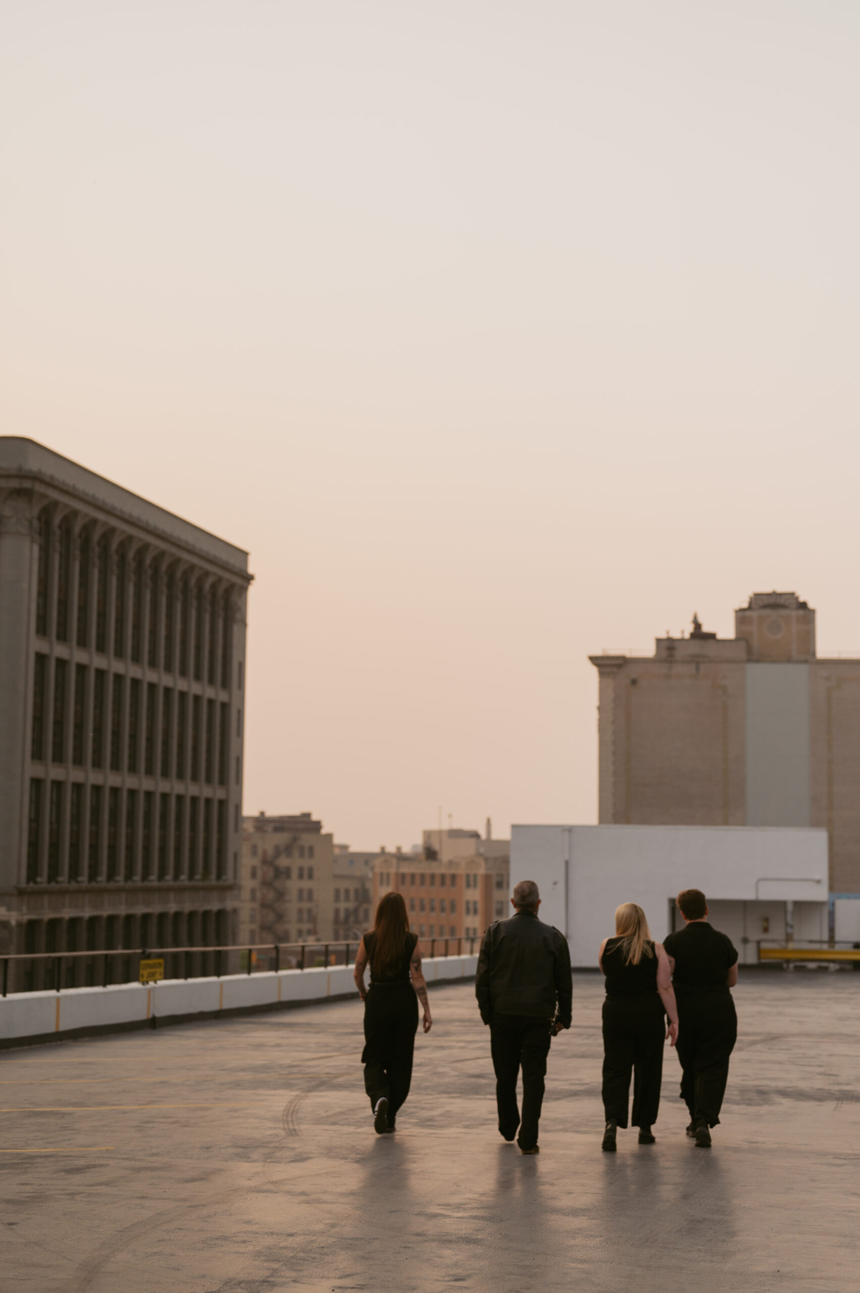 Photography team walking into the sunset